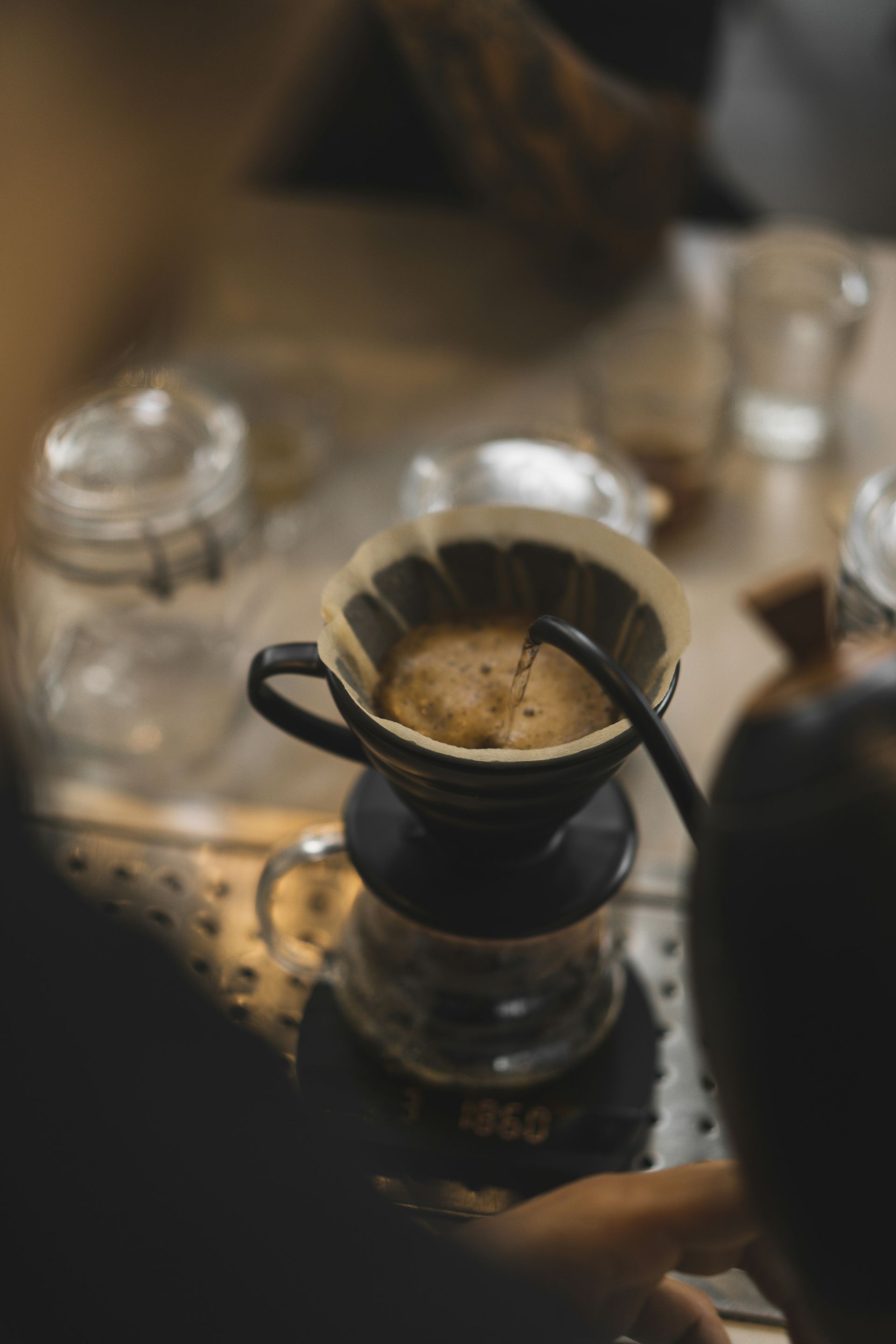 black liquid in clear glass cup